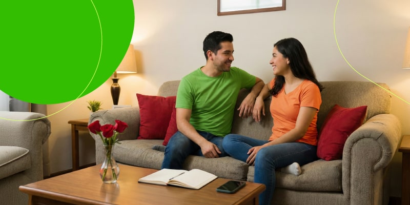 Pareja hablando de finanzas y planes en común antes de San Valentín.
